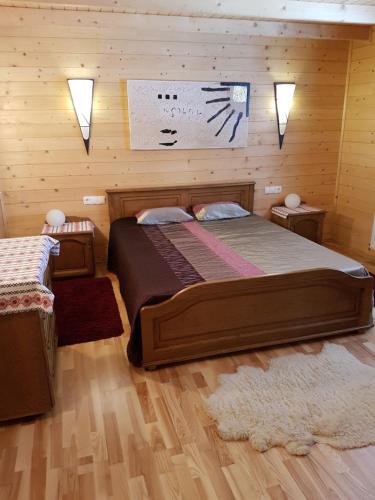 Giường trong phòng chung tại Casa de la Lac