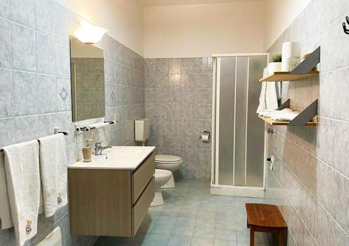 a bathroom with a sink and a toilet at Al Palmento in Galati Mamertino