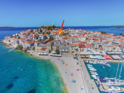 an aerial view of a town on a beach at Apartment Rosa in Primošten