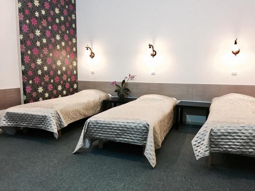 מיטה או מיטות בחדר ב-Maria Hostel