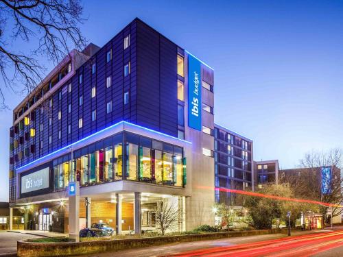 a large blue building with a street in front of it at ibis budget London Heathrow Central in Hounslow