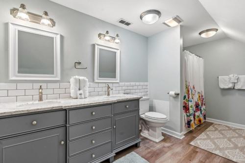 a bathroom with a sink and a toilet at Antigua Breeze - 3rd Row - Windy Hill Section in Myrtle Beach