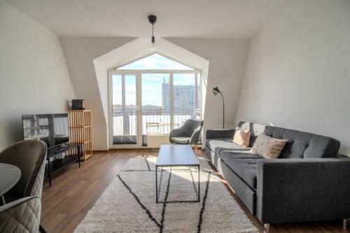Foto Modernes Apartment mit Balkon & Gratis Parkplatz bei Uniklinik
