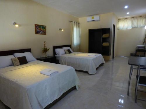 Llit o llits en una habitació de Cabañas Zoh Laguna Calakmul