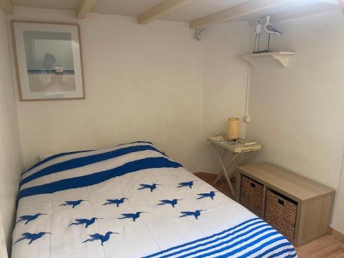 Llit o llits en una habitació de Maison de plage