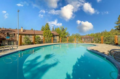 a large swimming pool with blue water at Cozy Bear's Lair in Tahoe City