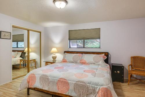 a bedroom with a bed and a mirror at Creative Escape! Eagle's Nest Hideaway in Cottage Grove