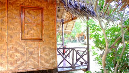 a door on the side of a building at Andaman Sunflower in Ko Lanta
