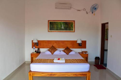 Postel nebo postele na pokoji v ubytování Chillhouse Lembongan