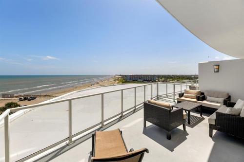 a balcony with a view of the beach at XL Terrace, Lazy River, I-O Pools, Game Room, Spa, Beach, Luxury 2-2 Penthouse! in Galveston