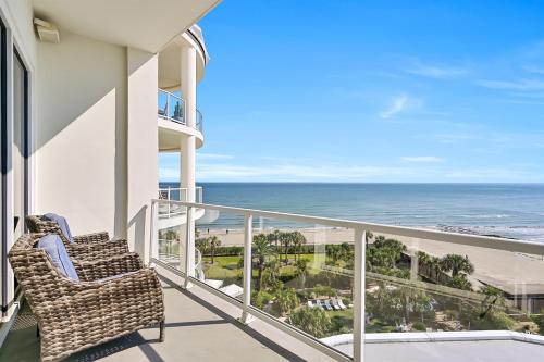 a balcony with a view of the ocean at PH, Balcony, Lazy River, I-O Pools, Game Room, Spa, Beach, Luxury 2-2 Penthouse! in Galveston