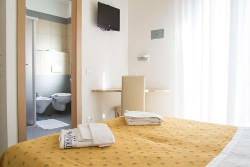 Posteľ alebo postele v izbe v ubytovaní Hotel Nautilus