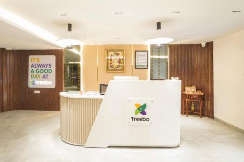 an office with a sign that reads its always a good day atitcher at Treebo Premium Indus Crown in Noida