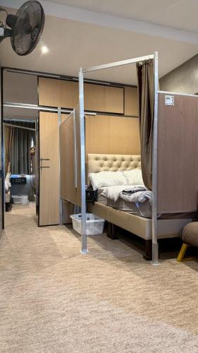 a bedroom with a bunk bed in a room at Nonoteru Chiangmai in Chiang Mai