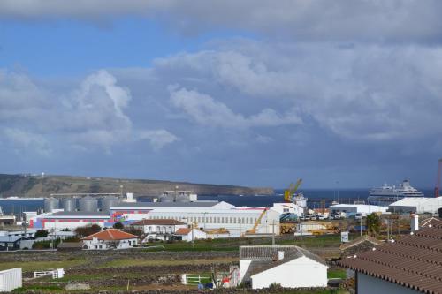 a view of a city with buildings and the ocean at Casa de Santa Catarina in Cabo da Praia