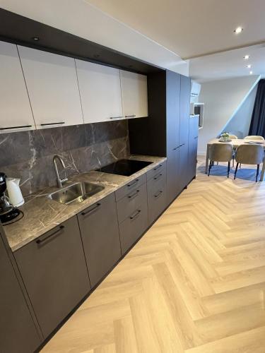 Køkken eller tekøkken på Appartementen het Centrum