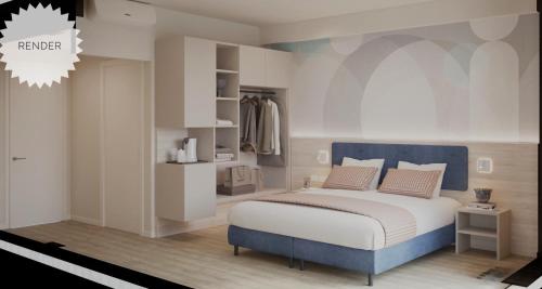 a bedroom with a large bed with a blue headboard at Hotel Bologna in Lignano Sabbiadoro