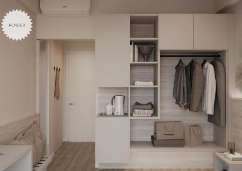 a walk in closet with white walls and shelves at Hotel Bologna in Lignano Sabbiadoro