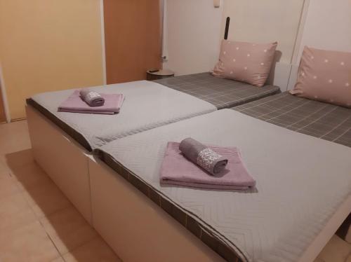 Llit o llits en una habitació de Apartment Simple Center