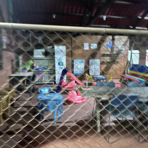 a view of a play area with toys in it at Chalé com PISCINA Privativa, com 2 QUARTOS, ESTACIONAMENTO em Condomínio com PORTARIA 24h, Sauna, Quadras, 3 PISCINAS no condomínio, Pesca e Parquinho Infantil - SmarTV na sala de estar, TV na área CHURRASQUEIRA, Wi-Fi e Cozinha Completa in Atibaia