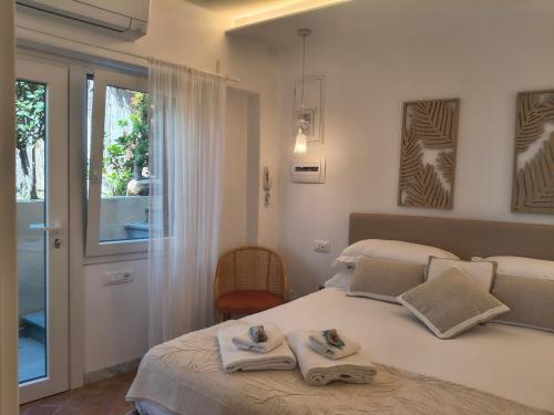 a bedroom with two beds with towels on them at Raggio di Luna in Manarola