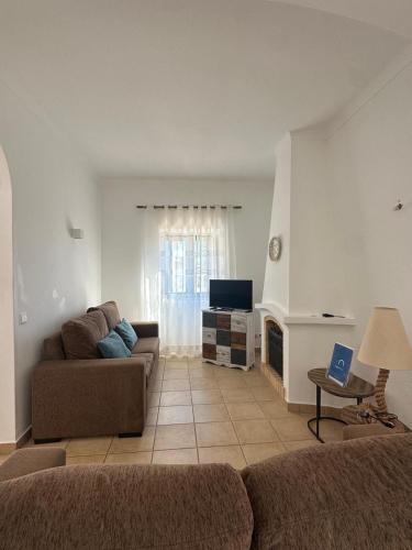 אזור ישיבה ב-Vila Mar Central