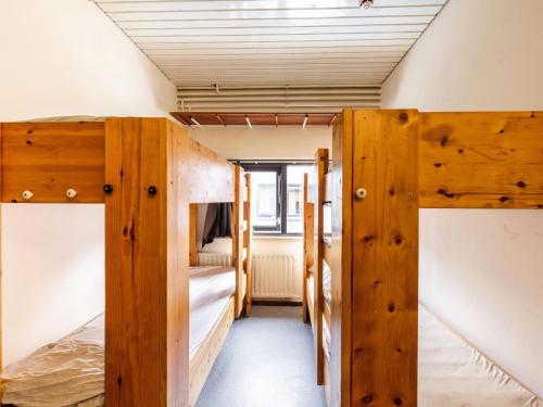 a small room with two bunk beds in it at Lakes XL in Kaag