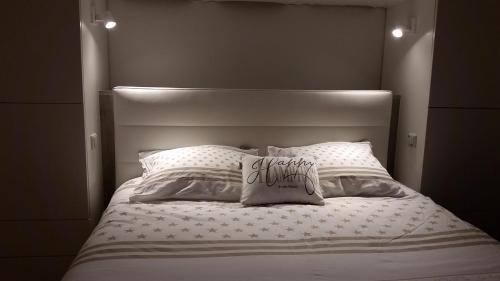 Een bed of bedden in een kamer bij l'Intervalle