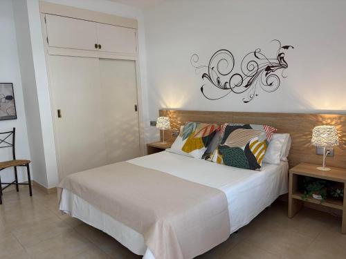 Apartamento a pie de playa, climatizado y parking