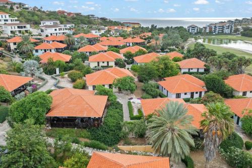 an aerial view of a residential neighborhood with orange roofs at Luxury Villas with Panoramic View in Blue Bay in Blue Bay