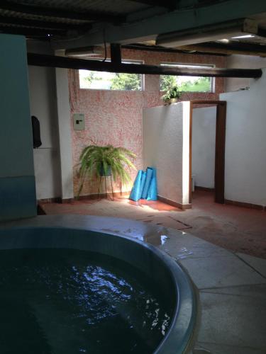 a large pool of water in a room at Mansion Samzara Hosteleria in Sangolquí