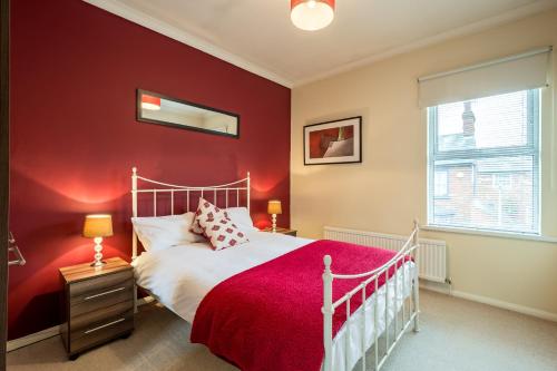 מיטה או מיטות בחדר ב-Linslade Apartment - for Groups and Contractors