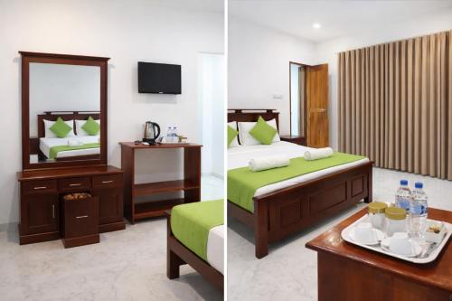 a hotel room with a bed and a mirror at Enara Luxury Stay in Katugastota