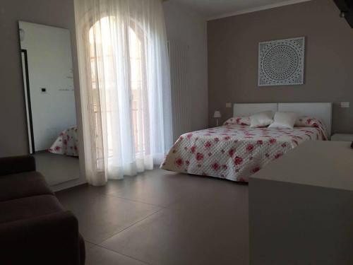 Katil atau katil-katil dalam bilik di B&B Belvedere