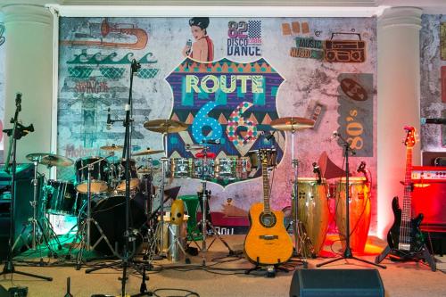 a room with a group of musical instruments on display at Al Qurum Resort in Muscat