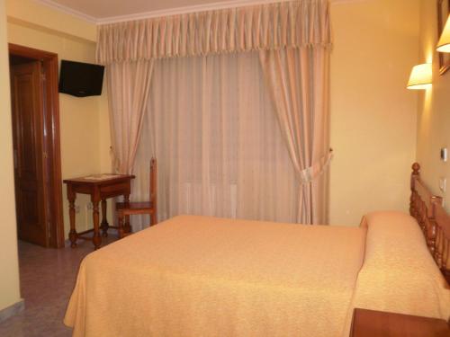 Katil atau katil-katil dalam bilik di Hotel La Costera