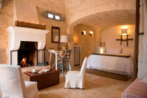 Postel nebo postele na pokoji v ubytování Masseria Salinola