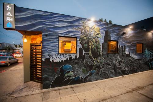 a mural on the side of a building at PodShare East Hollywood in Los Angeles