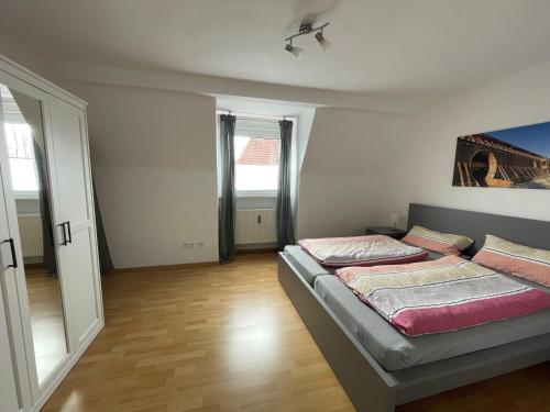 a bedroom with two beds in a room at Fewo Haus Piepenbreier in Bad Sassendorf