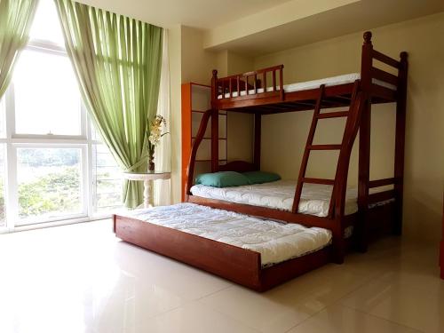 Postel nebo postele na pokoji v ubytování Myna Lagoon Pico de Loro