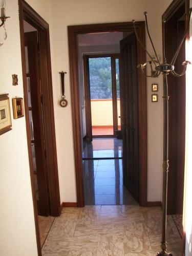 a hallway with two doors and a mirror at Ca'di Gilbi e Pasqui in La Spezia