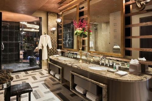 a bathroom with a sink and a large mirror at The Westin Nashville in Nashville