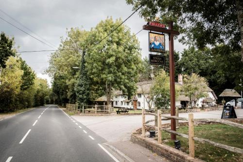 a sign on the side of a road at The Pilgrim Inn in Southampton