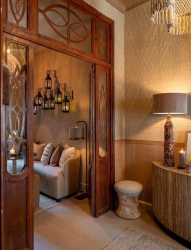 a living room with a couch and a table at Casa Con Destino in Jalón
