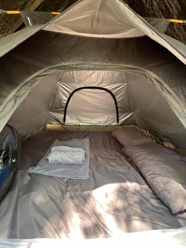 a large tent with a mattress in it at Zulu land Kohlarn in Ko Lan