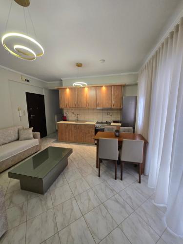 a living room with a couch and a table at Flogita Dream in Flogita