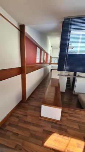 a living room with a glass table and a couch at Residenza 404 in Ivrea