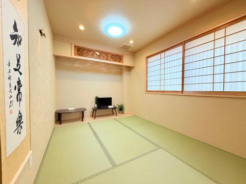 心斋桥 通天阁 难波2分钟 去Usj20分钟 车站仅3分钟 机场直达110平方大平层适合家庭出行