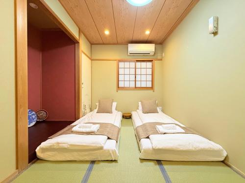 心斋桥 通天阁 难波2分钟 去Usj20分钟 车站仅3分钟 机场直达110平方大平层适合家庭出行