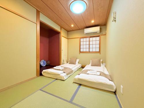 心斋桥 通天阁 难波2分钟 去Usj20分钟 车站仅3分钟 机场直达110平方大平层适合家庭出行